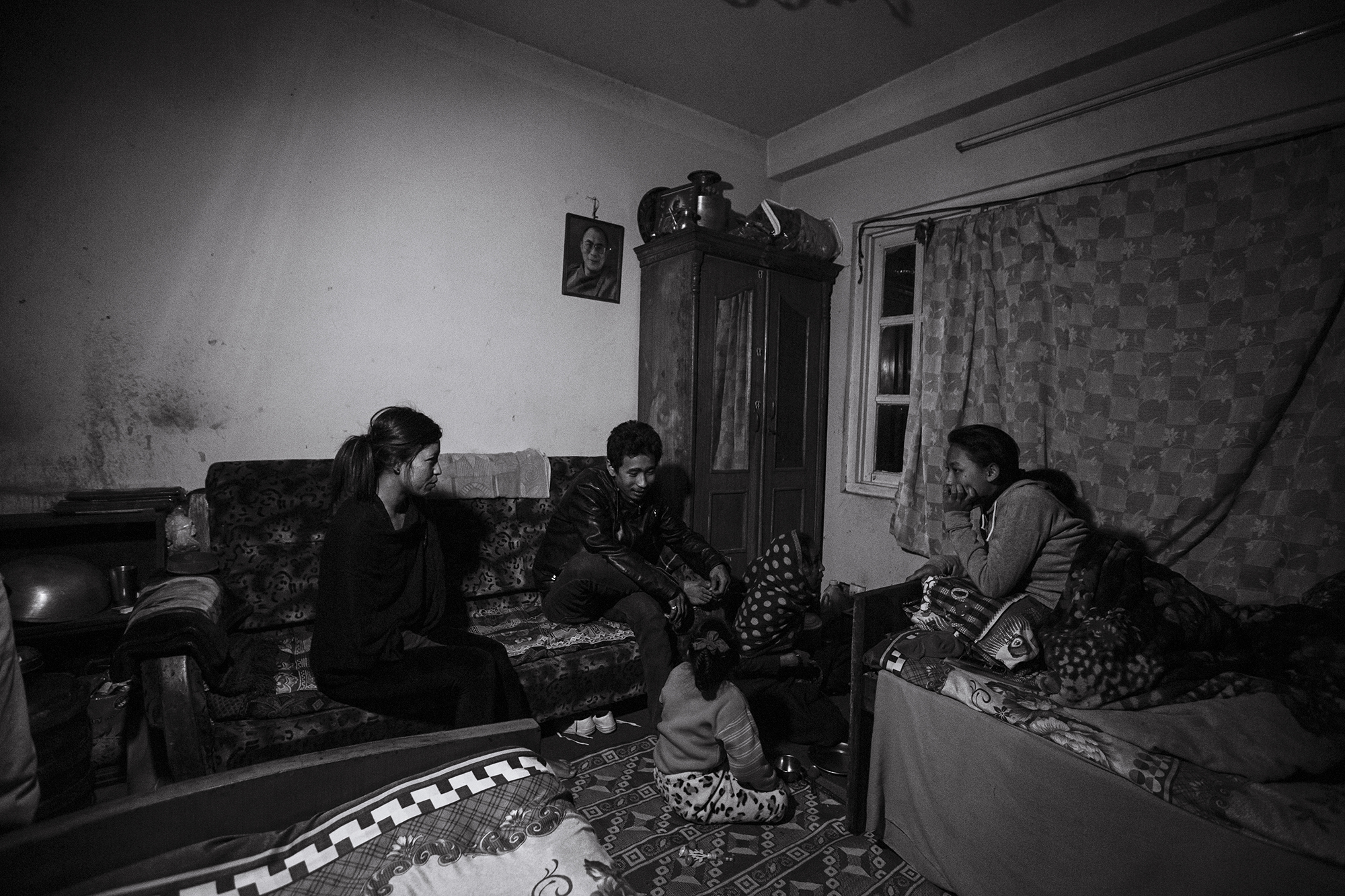 Anu's family spend the evening together in their home, prior to her departure for Egypt.