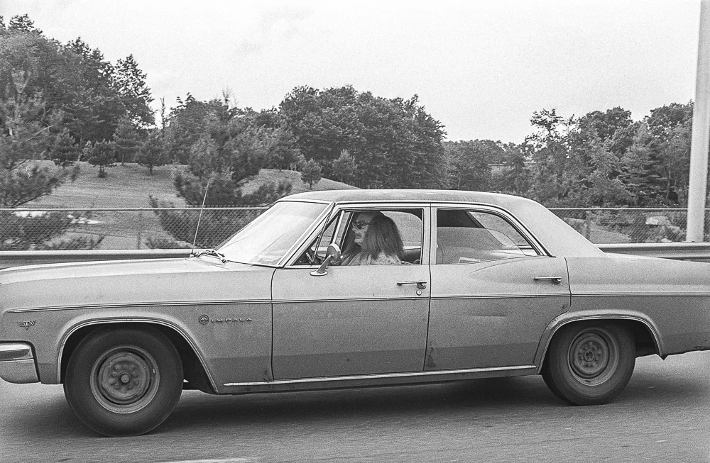 "Clown in Impala" 1976 - ©Lucien Samaha - (click to enlarge)