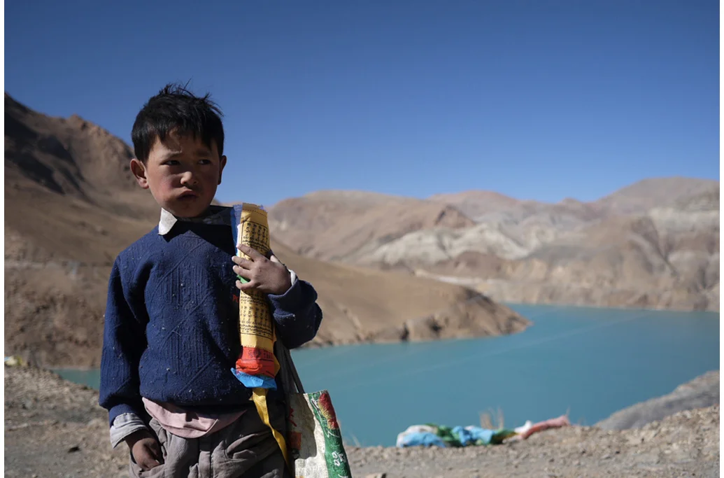Tibetan Prayer Flag Salesman - Tibet