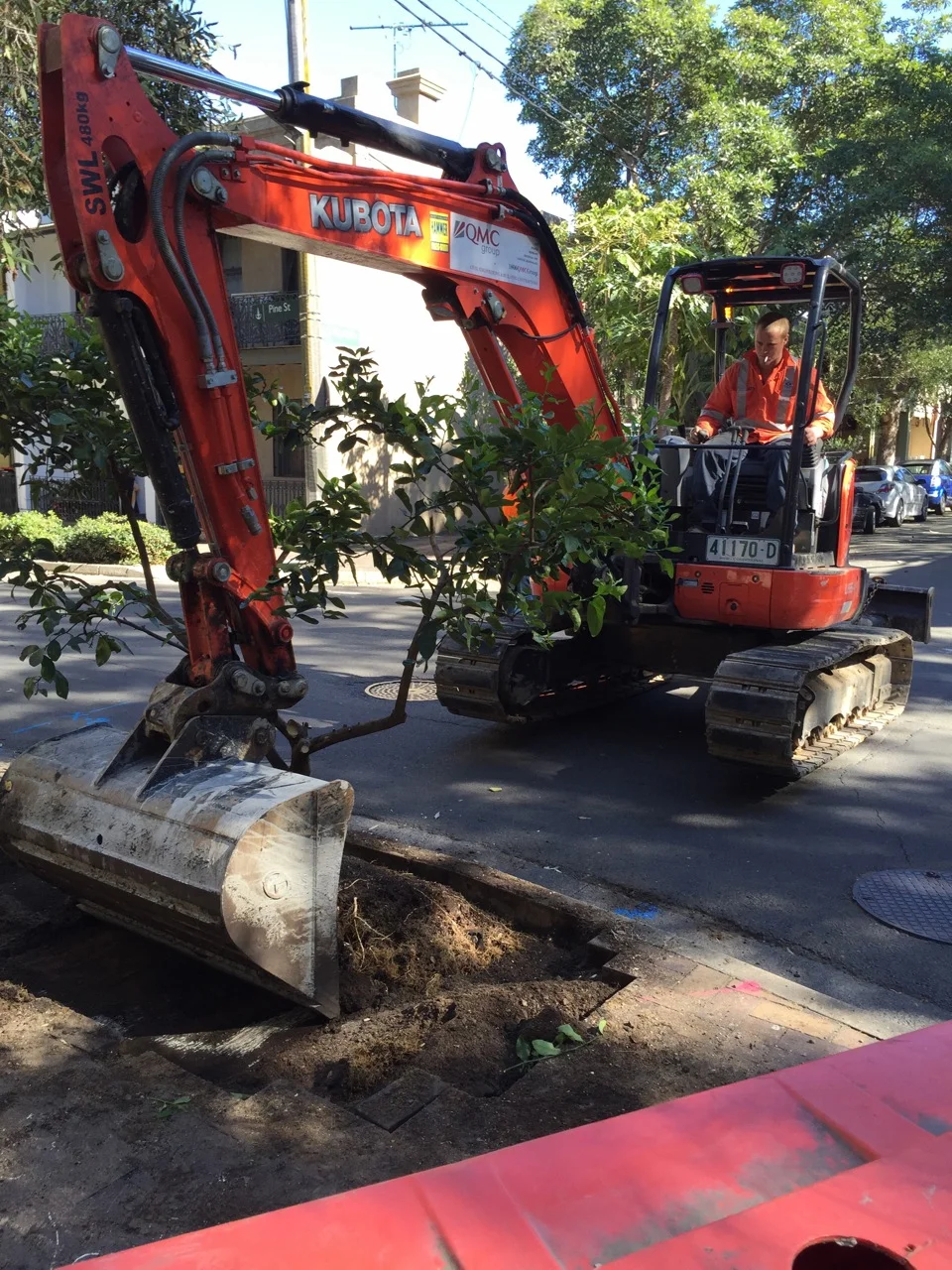 Michael from QMC, the contractors building the bike path, with his machine to lift and move the lime.