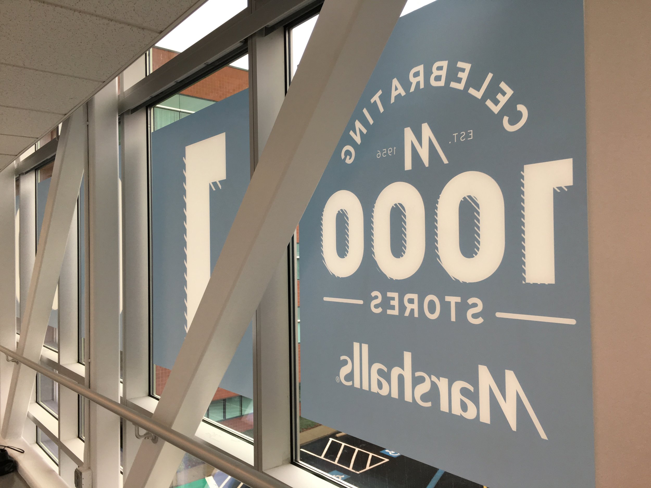 Installing the window graphics on the catwalk