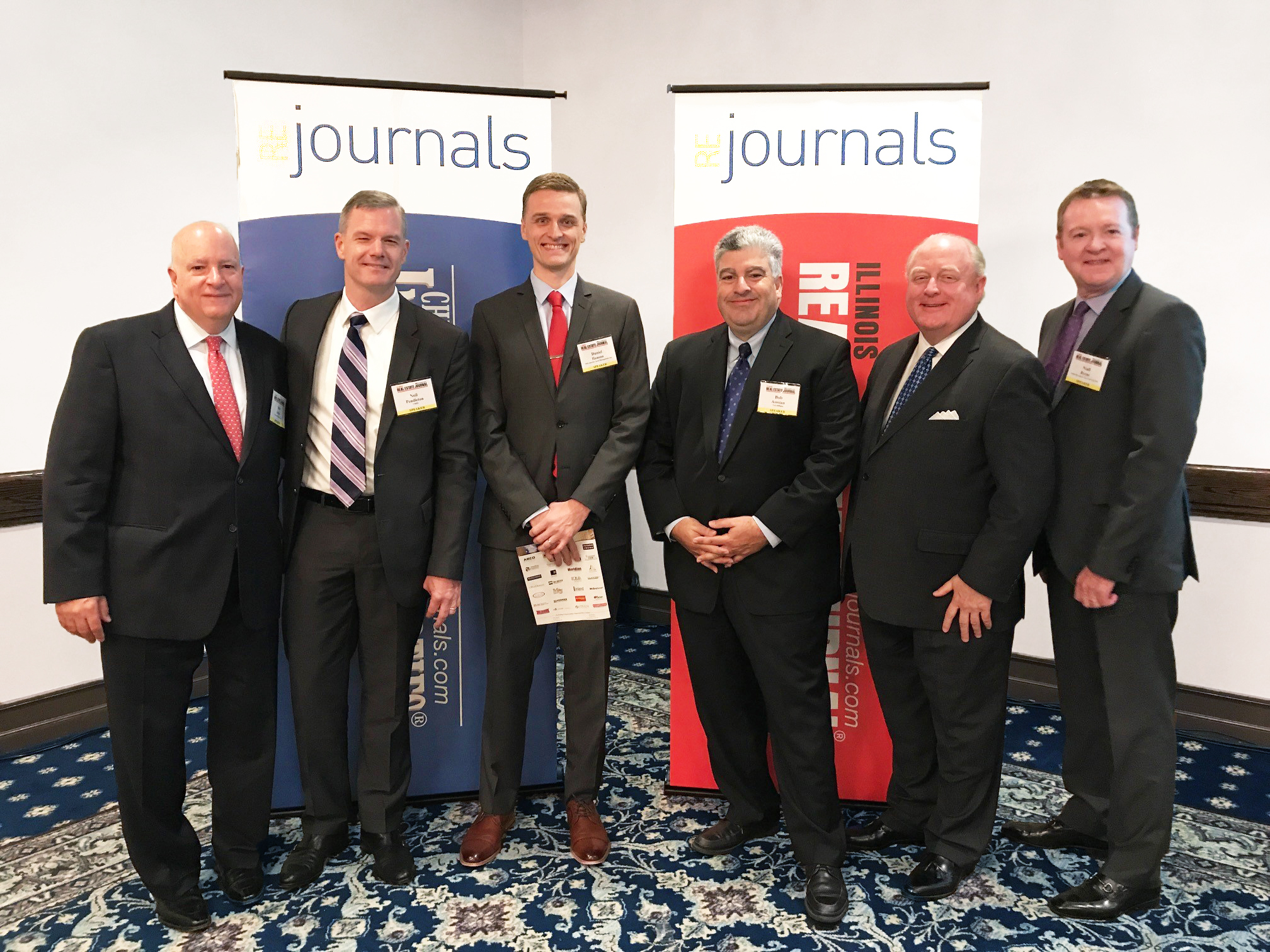  Pictured above, from left to right: Sam Delisi, NGKF; Neil Pendleton, CBRE; Daniel Hanson, Mid-America Asset Management, Inc.; Bob Assoian, NAI Hiffman; Bob Six, Zeller Realty Group; Niall Byrne, Inland Investment Real Estate Services. 