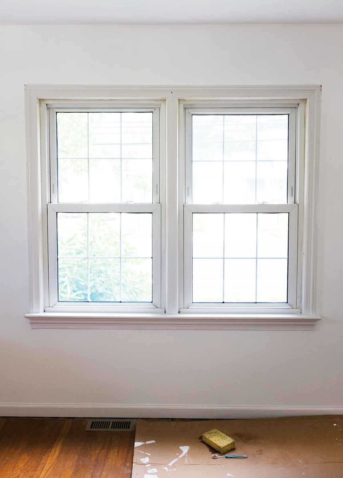 I spent the better part of Sunday scrubbing, sponging, bleaching and making annoyed noises at these windows. I can say in all honesty I don't know if they've ever been washed since they were installed. It took a long time, and I'm still not 100% satisfied with the level of clean that I got them to, but I will say.. each room got about a stop brighter after I finished the deep clean session. 