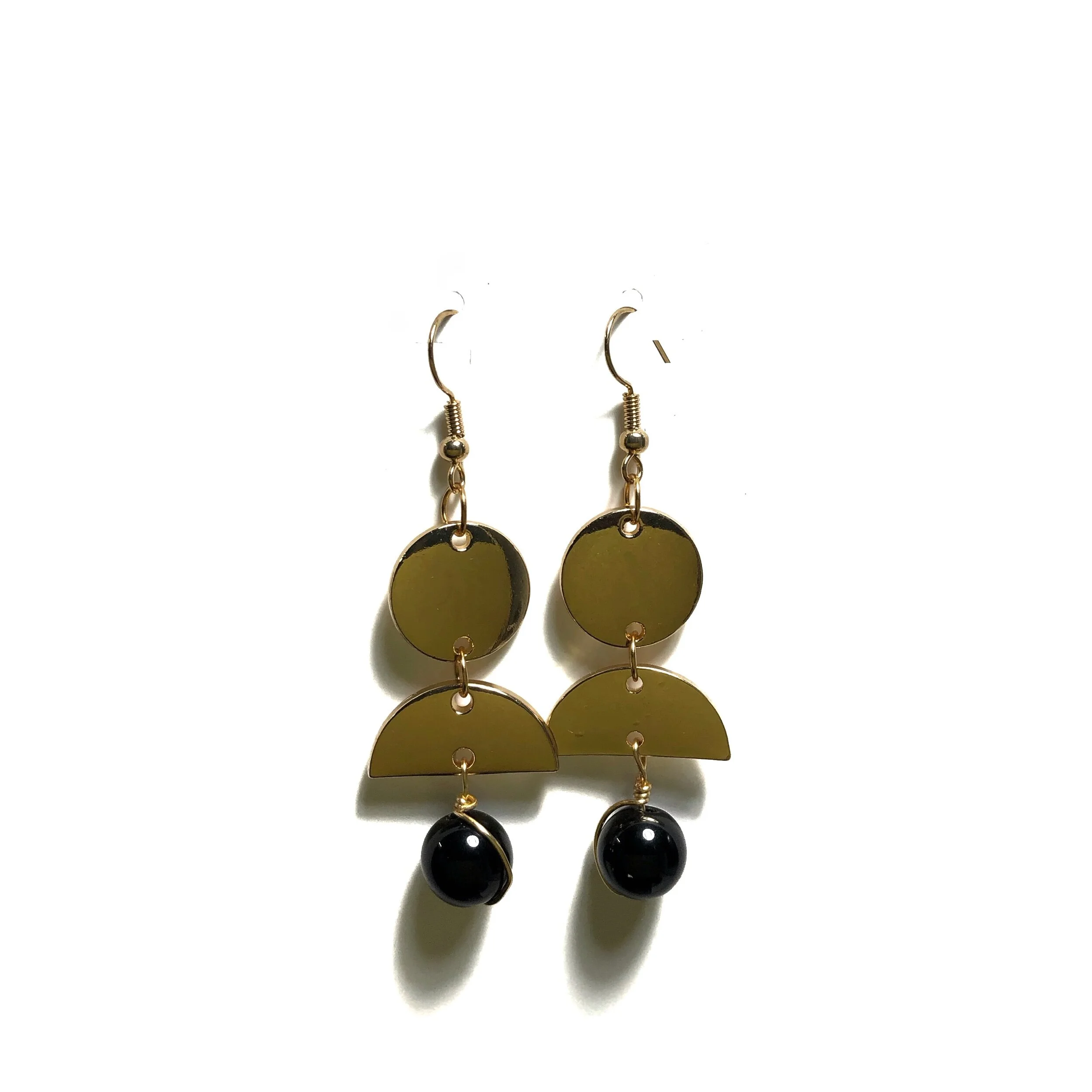 Geometric shape hanging bead earrings.