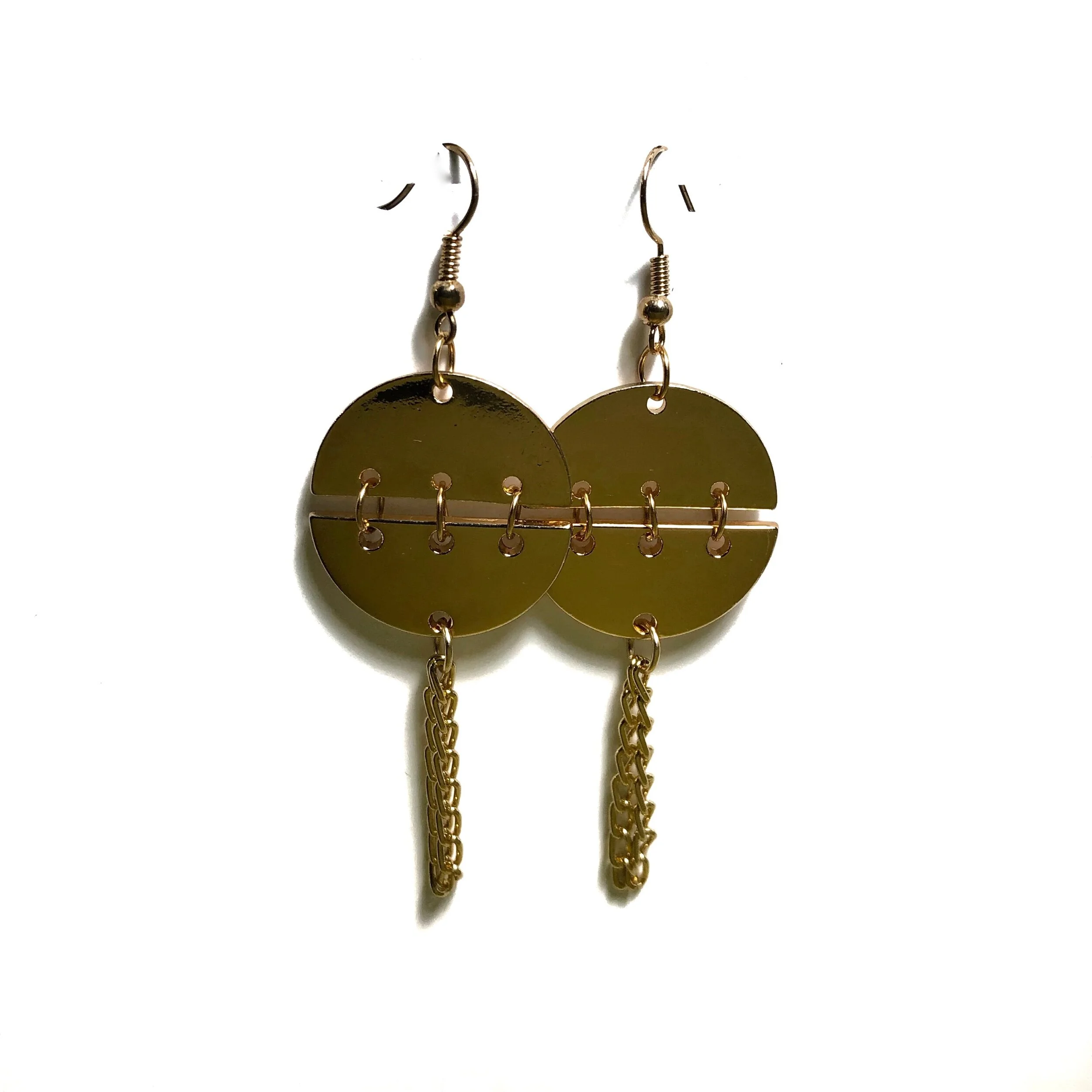 Boho gold-plated earring with chain attached.