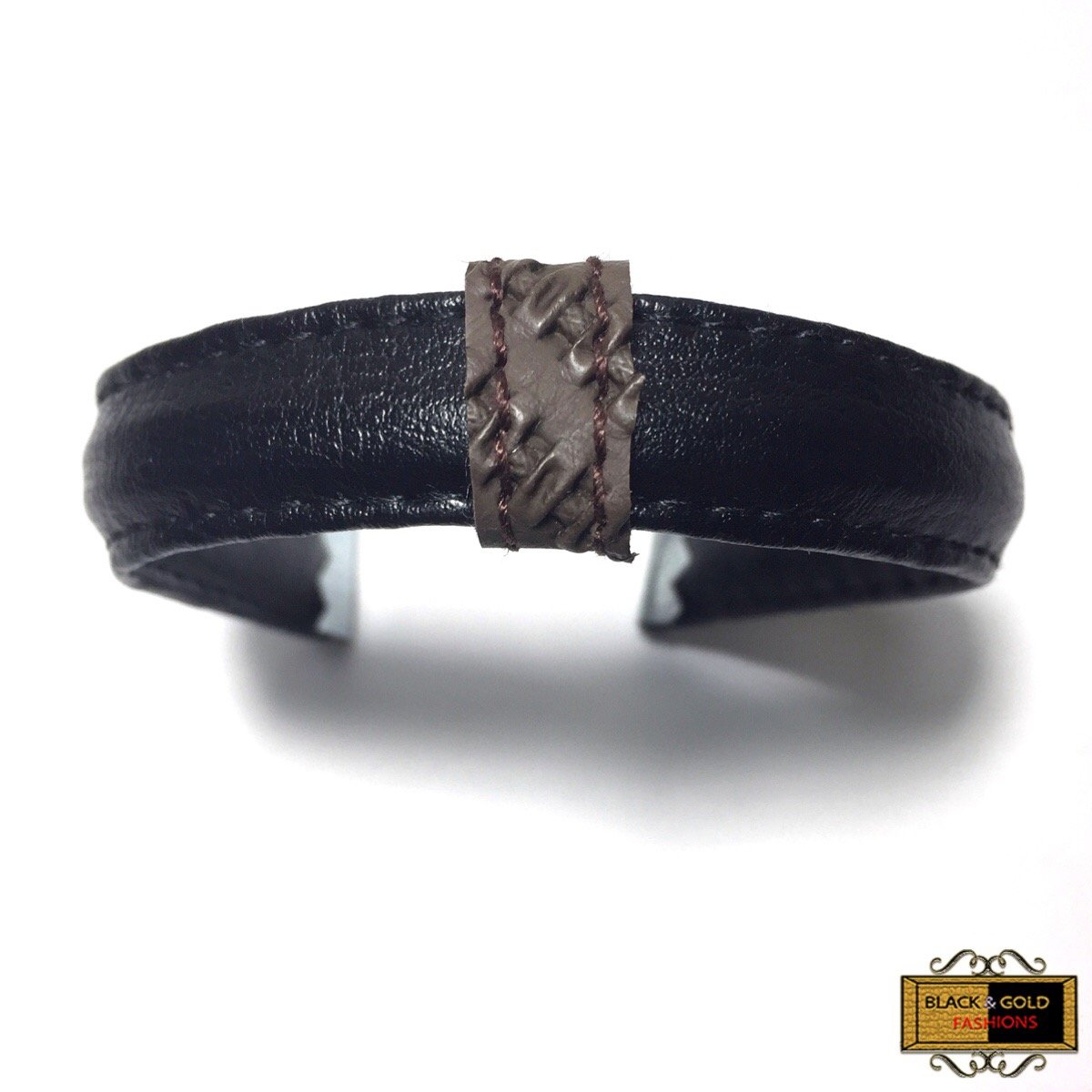 Fallon Cuff Bracelet is a unisex weave strap bangle.