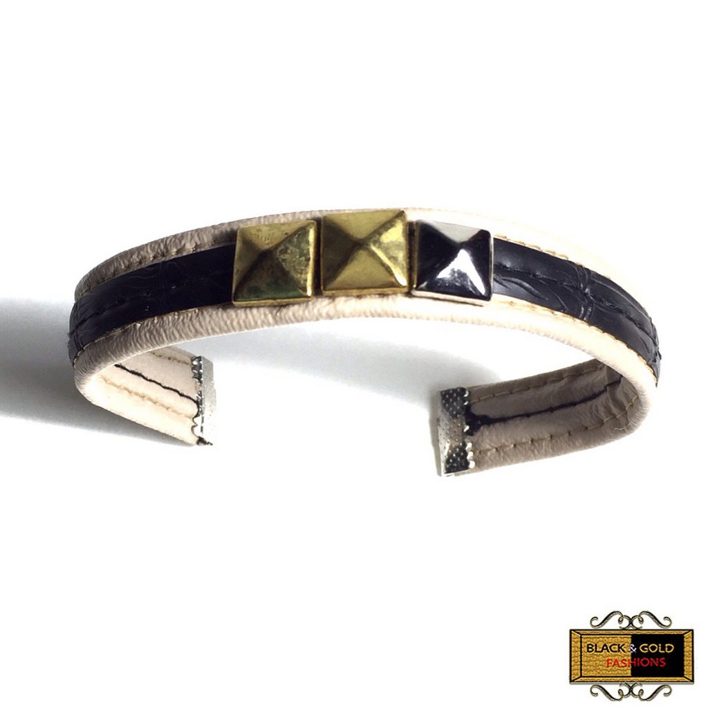 Isabel Cuff Bracelet features a gold-plated stud in the center.