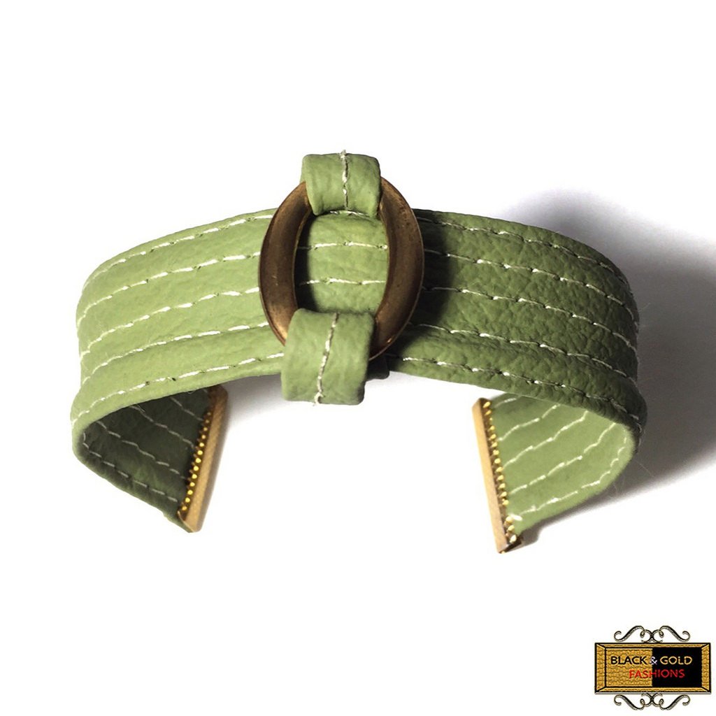 Olivia Cuff Bracelet is handmade with a stylish oval buckle for a classic touch.