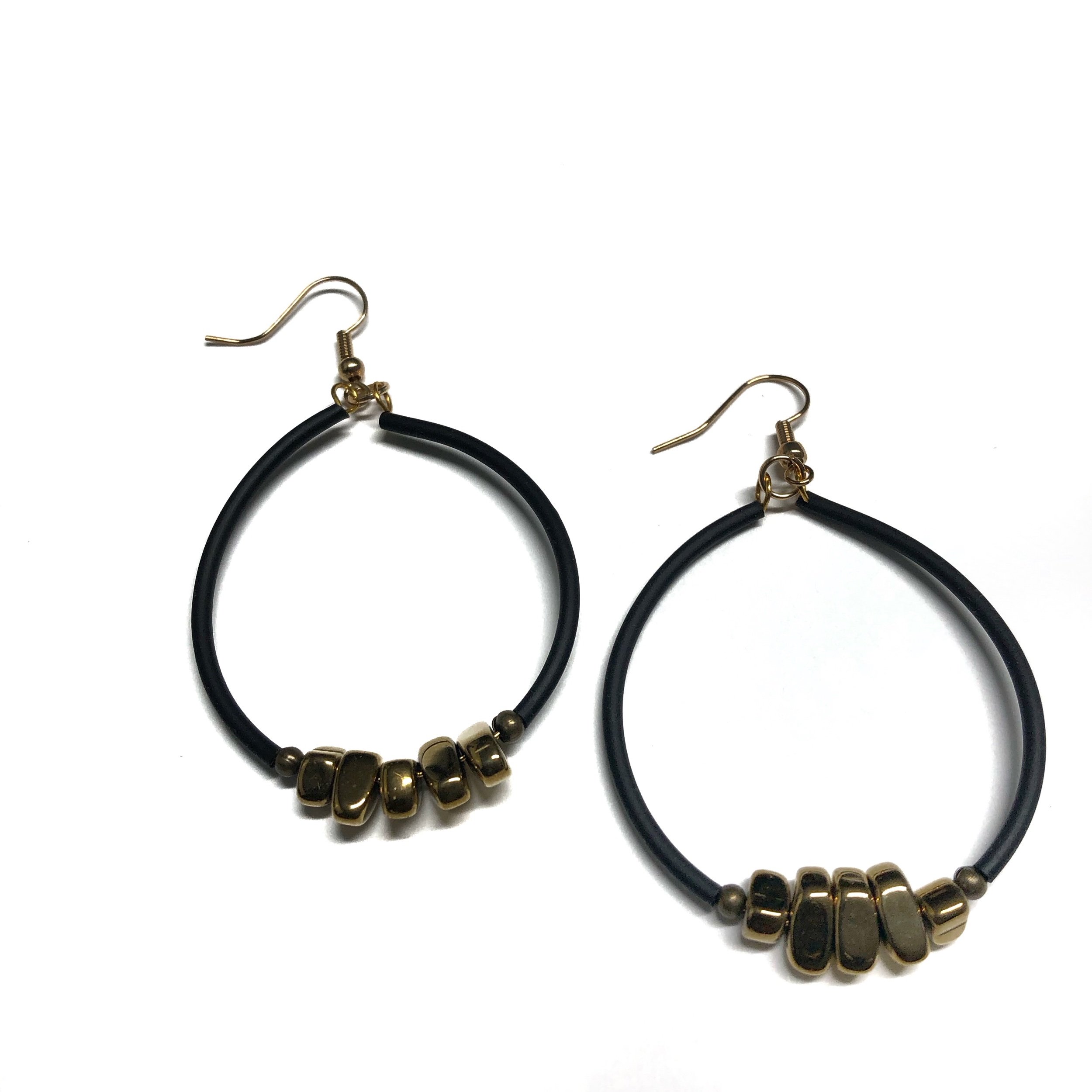 Round hoop earrings cluster bead center detail.