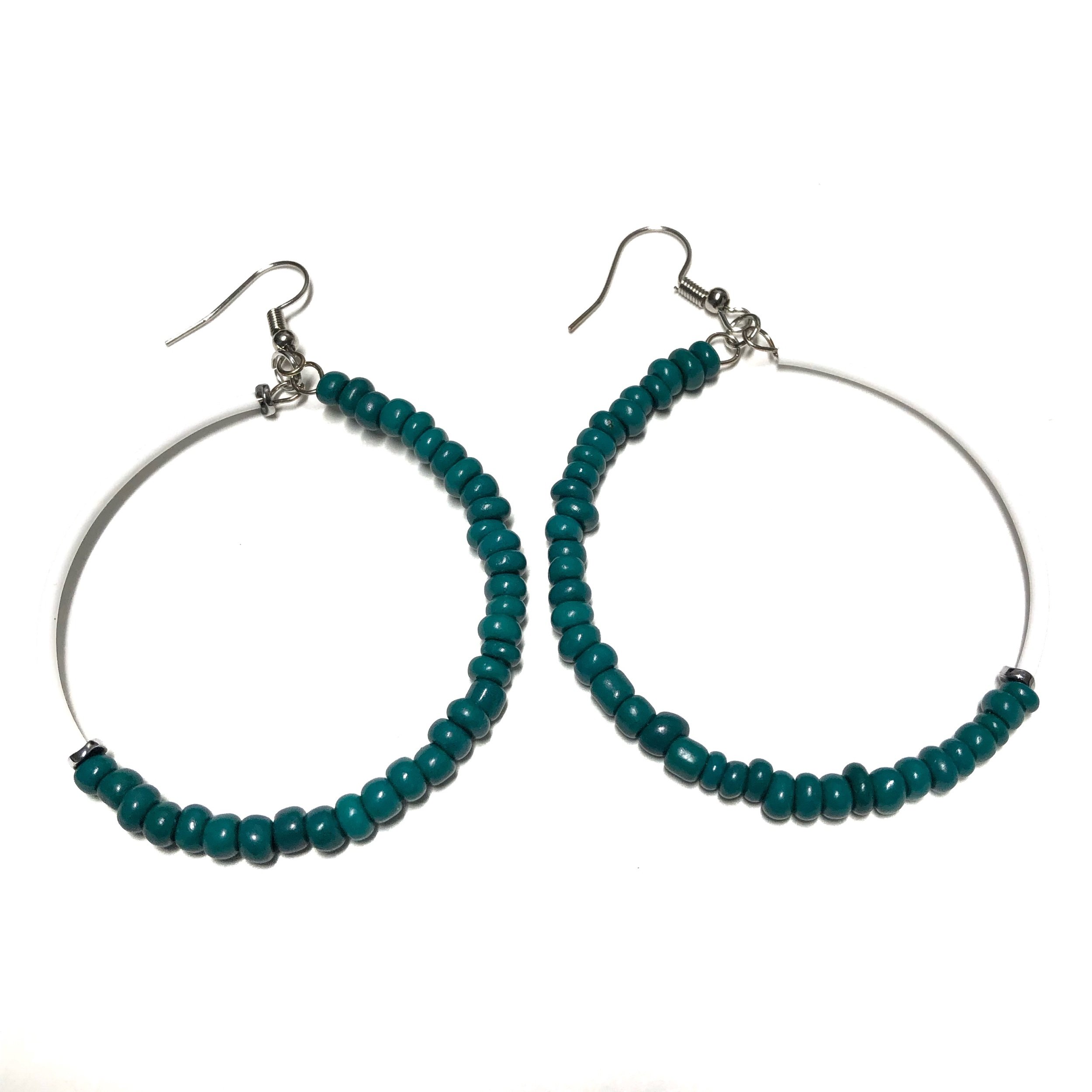 A bohemian style teal bead earrings for summer.