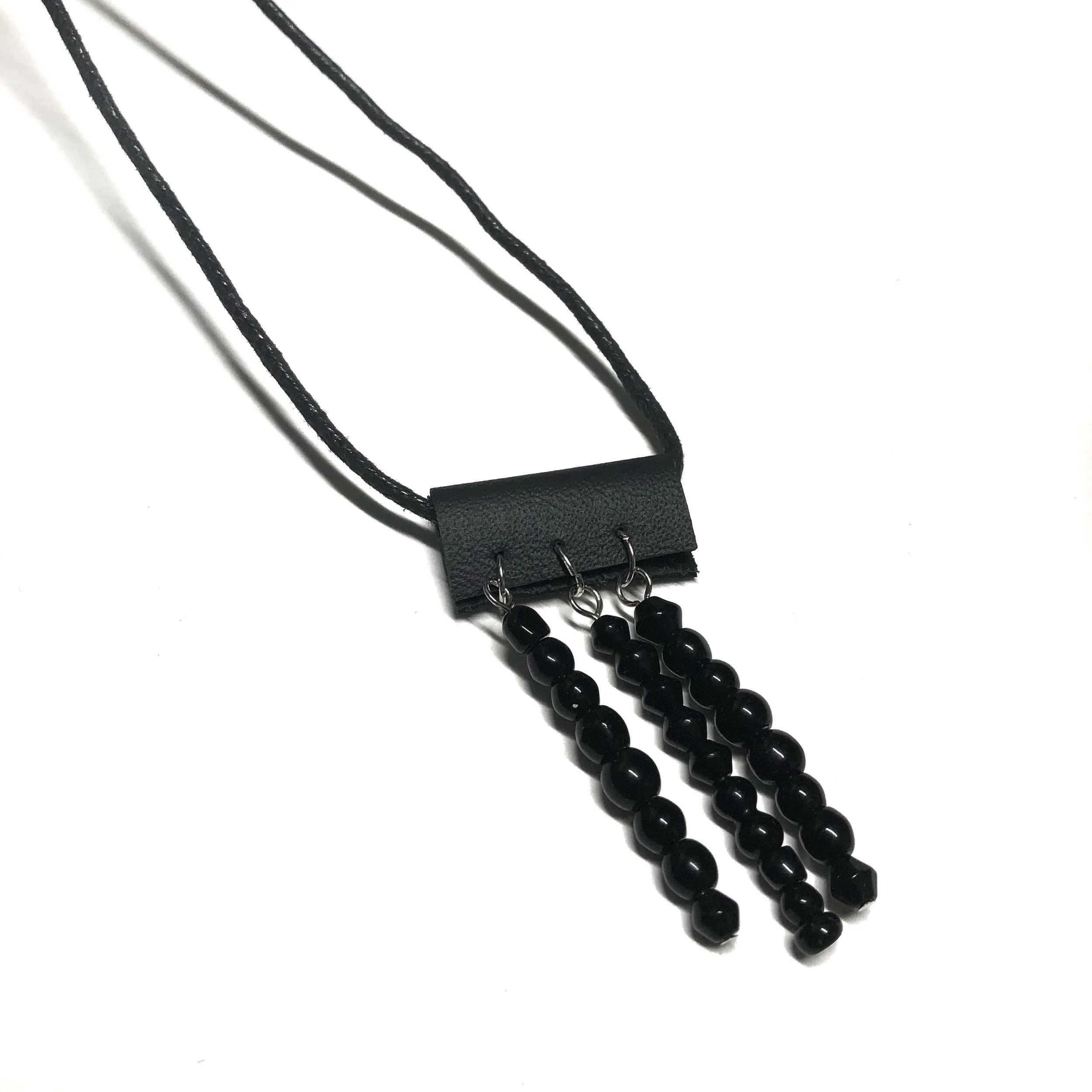 Leather beaded tassel necklace.jpeg