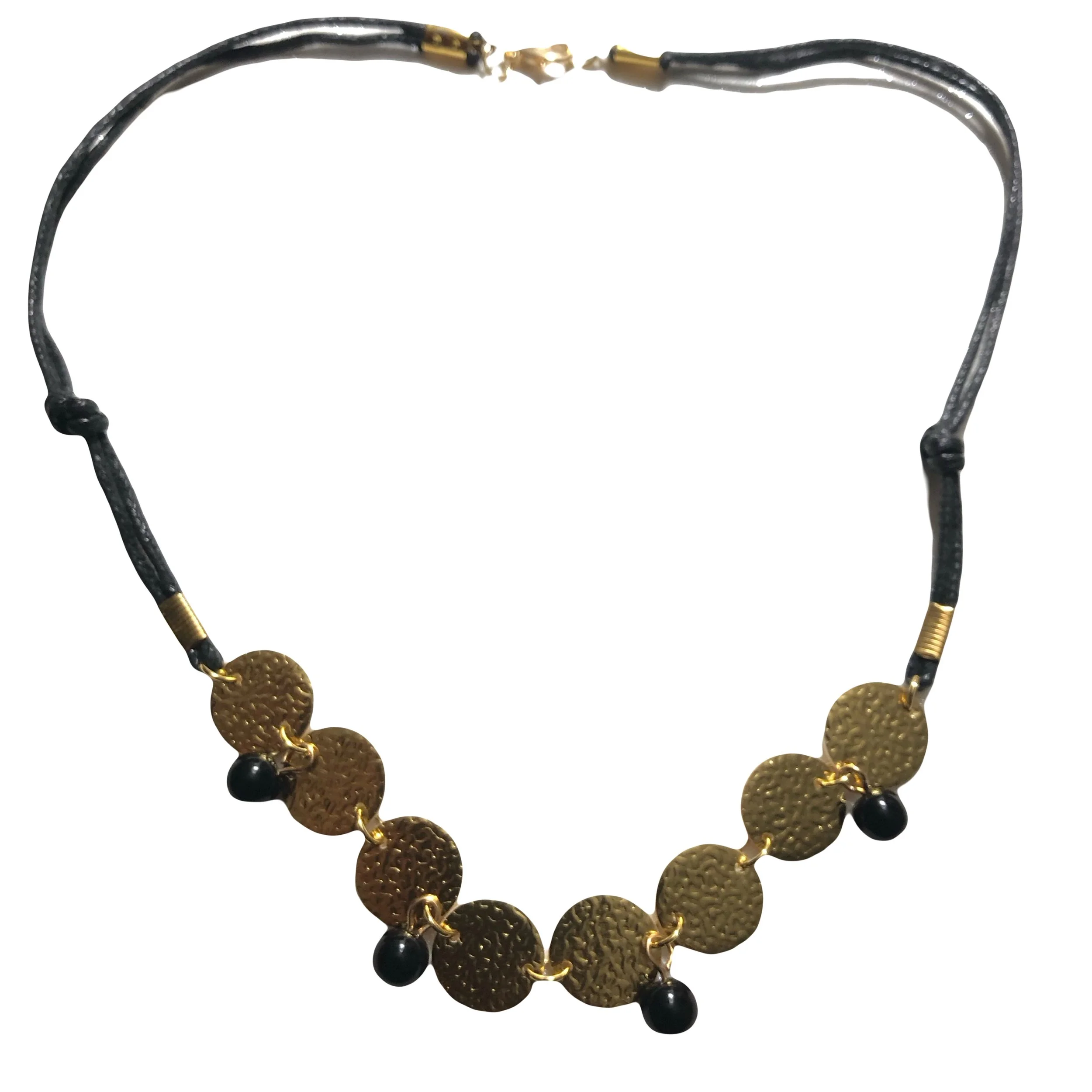 Circular pendant and beaded cord necklace.