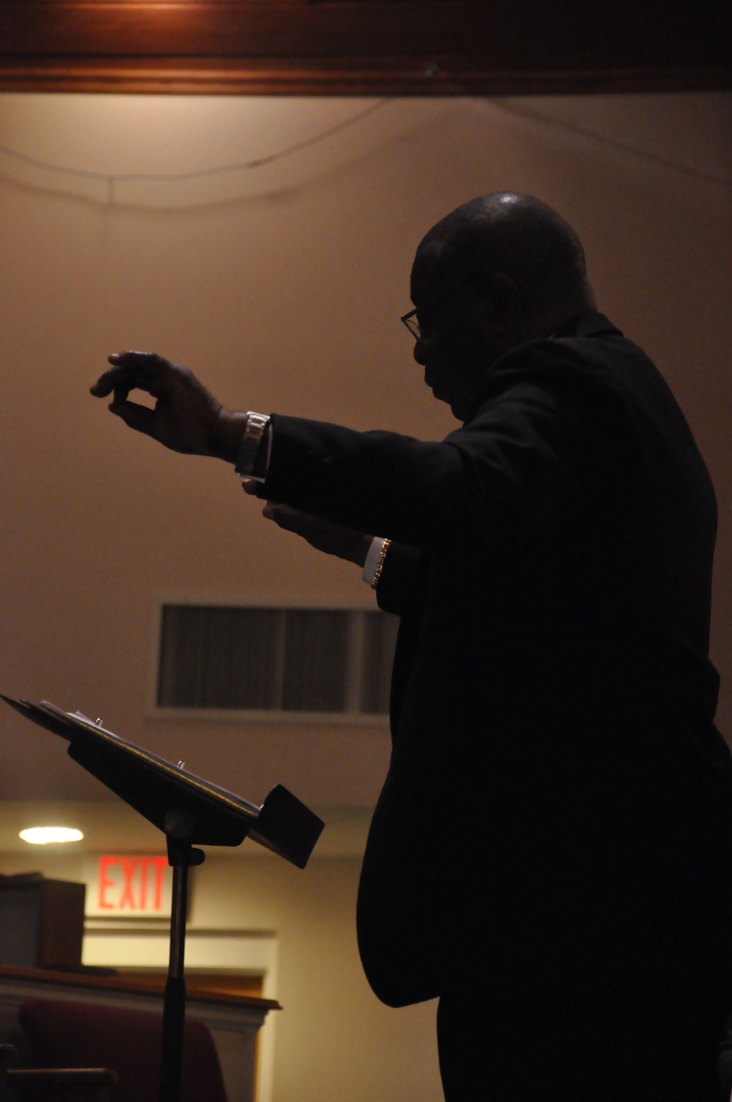 Conductor during a Black History Month concert
