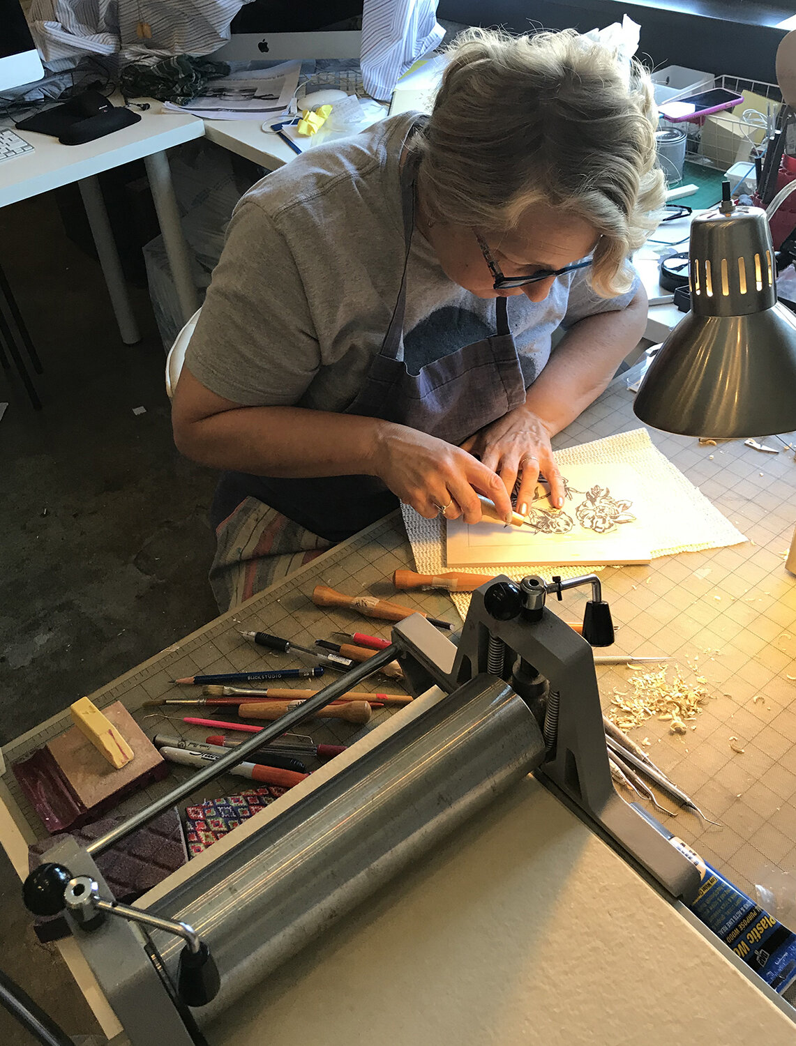 Carving the woodcut block