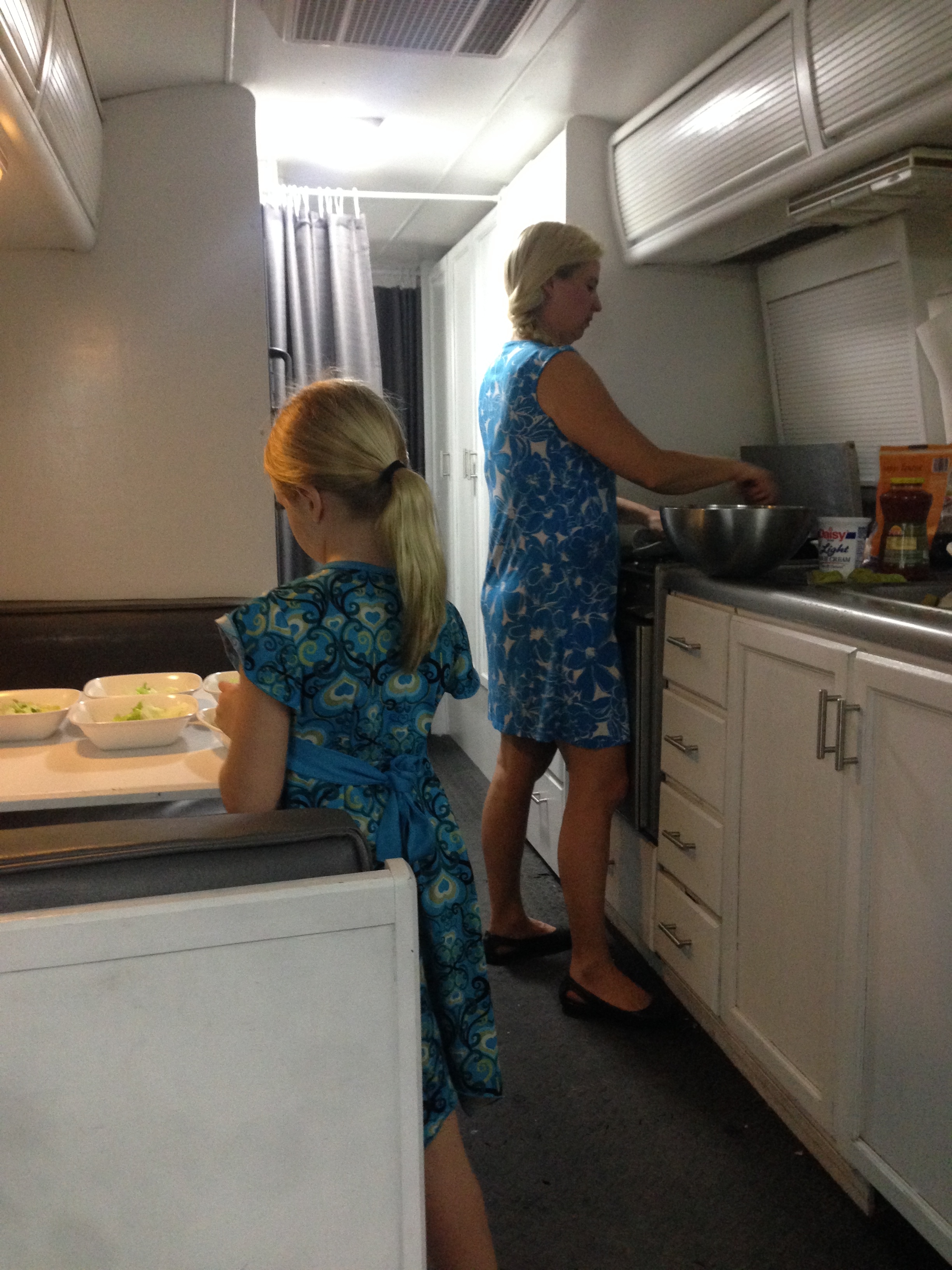 Michelle (& her twin Trinity) getting a meal ready.
