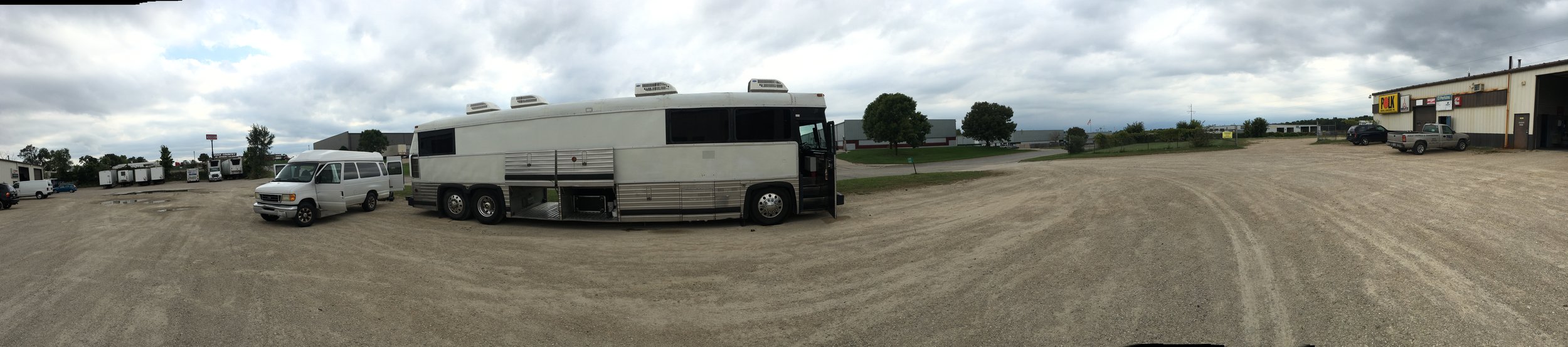 Unloading the music gear from the bus, into our van.