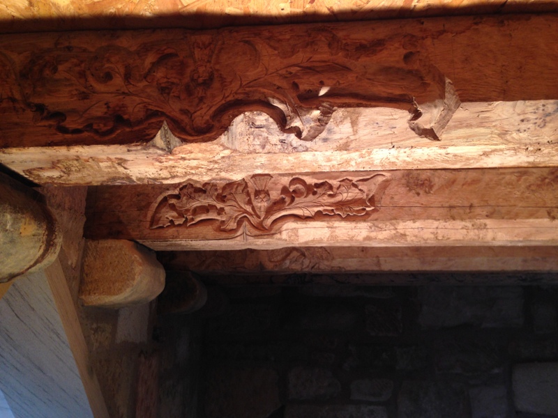 Thistle carving into oak beams