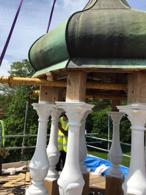 Carved supporting beams for clocktower