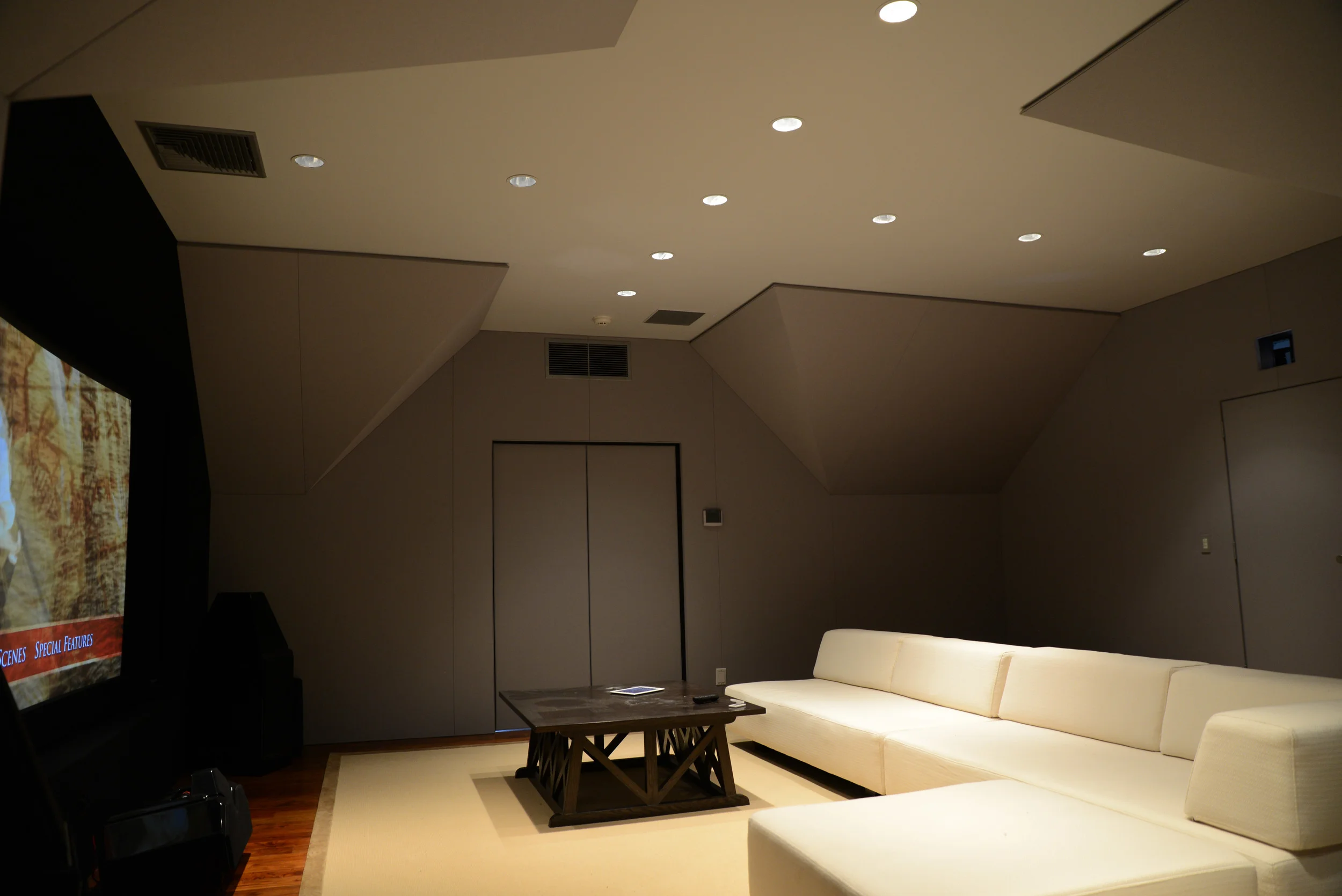 Realm deploys new Savant based theater using: Savant, Custom Acoustic Paneling, Krell, Wilson Audio, Lutron, Stewart Film, and Runco.