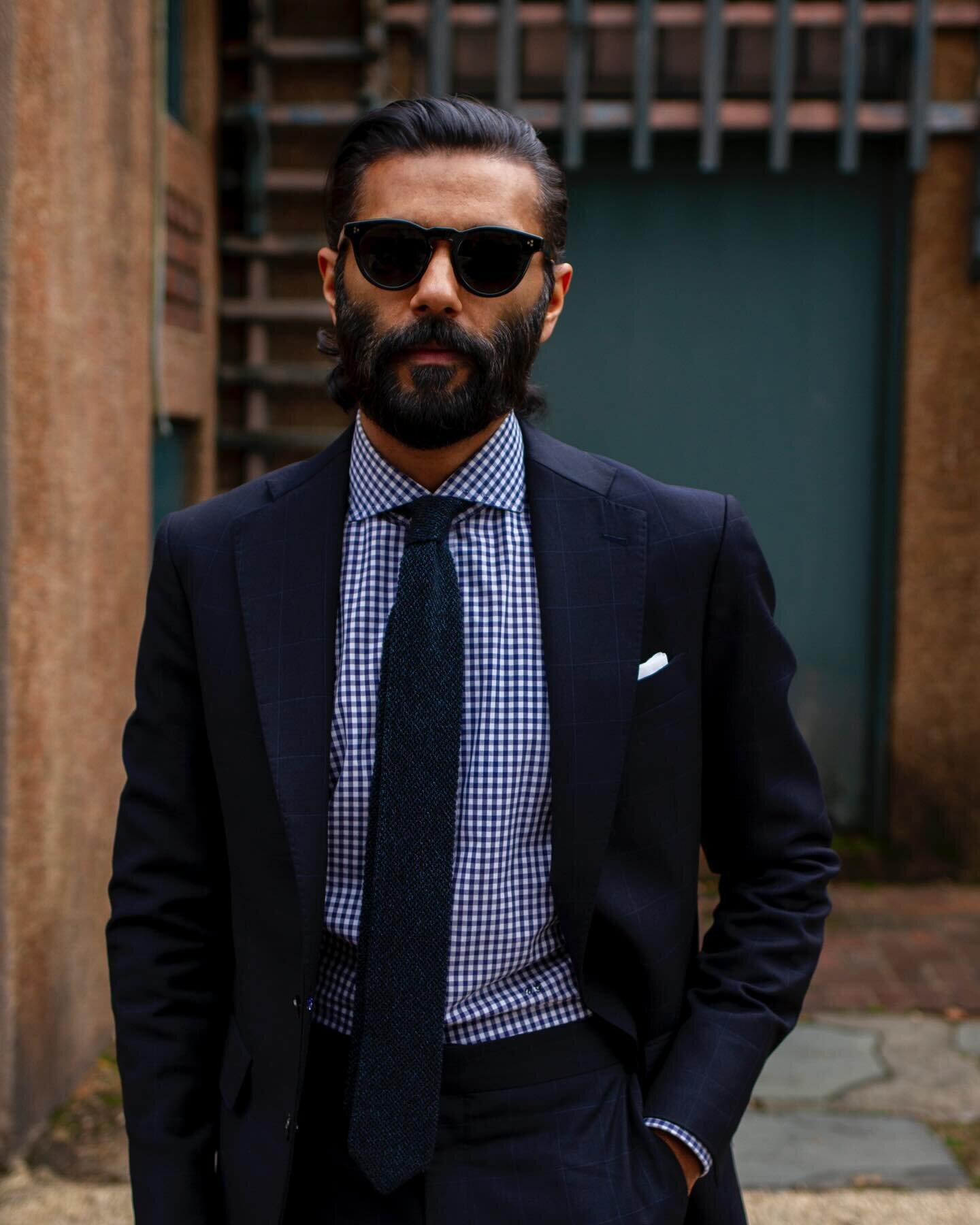 The windowpane pattern showcases slender intersecting lines, both vertically and horizontally, forming elongated rectangles reminiscent of a windowpane. Incorporating this bold suit feature imparts a sense of sophistication and elegance to any attire