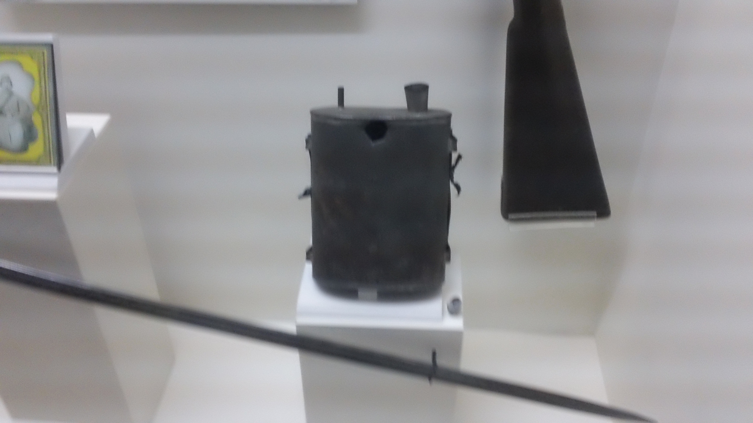  Shot through his canteen, the soldier who wore this died, and his family saved the bullet which you can see at right.&nbsp; 