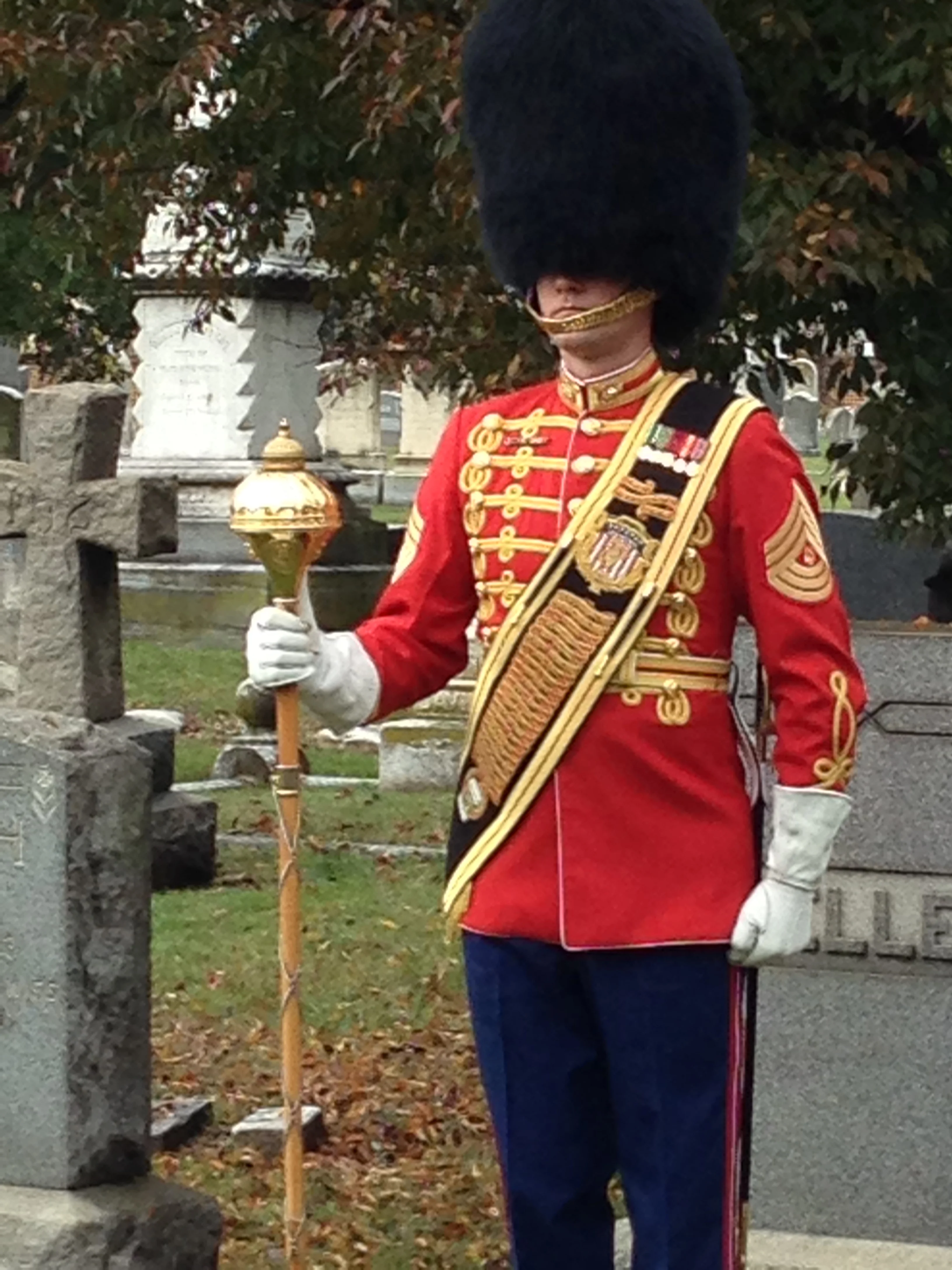 The ever impassive drum major . 