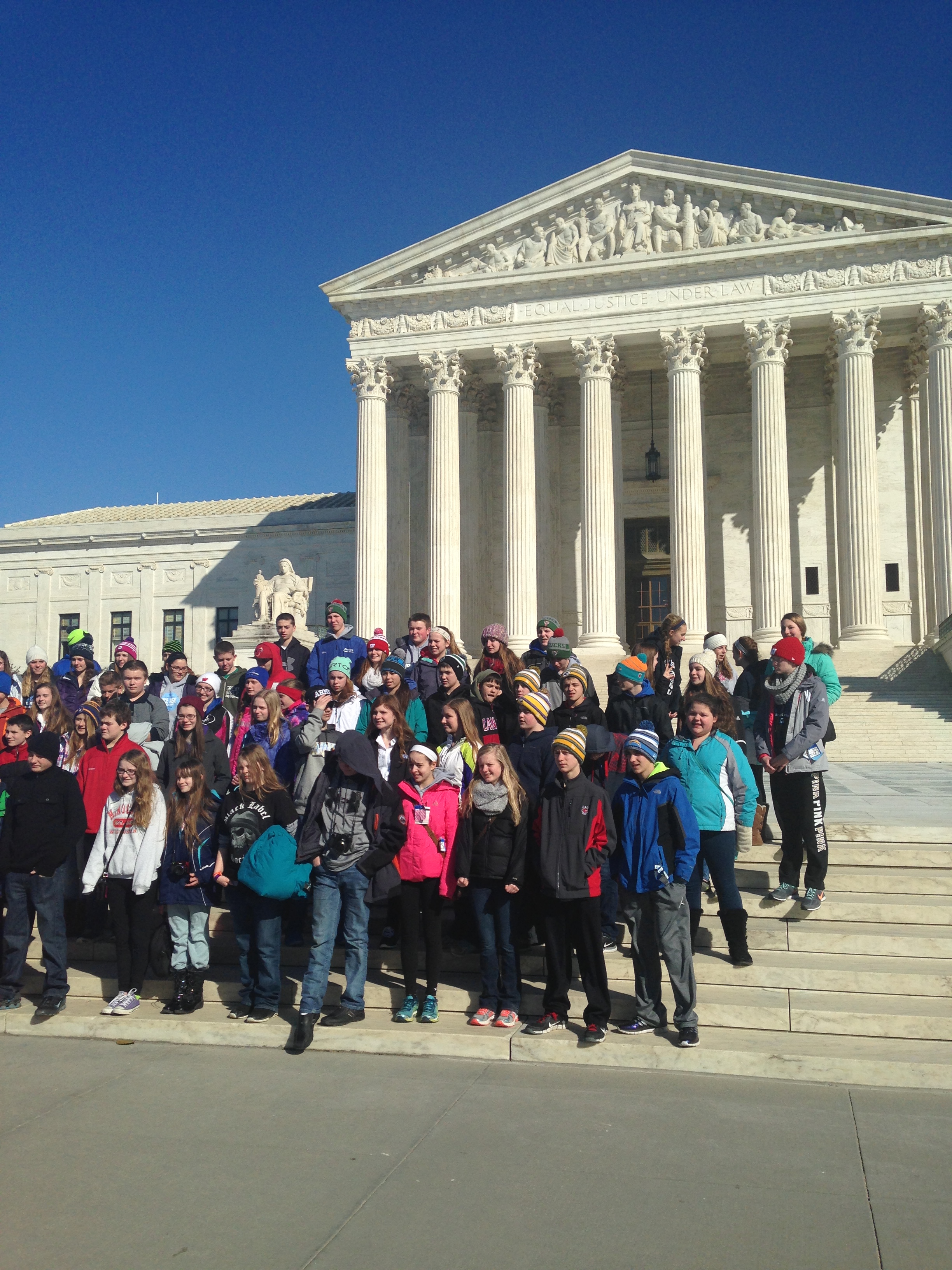 The kids in front of the Supreme Court.