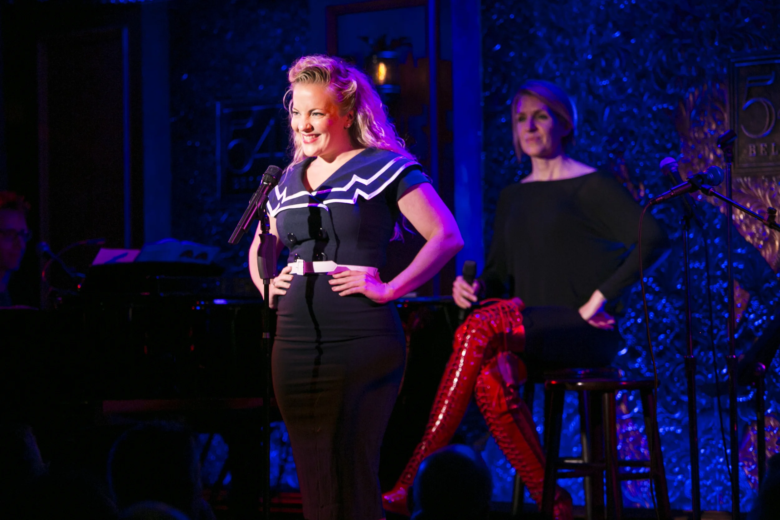 Singing at 54 Below while host Susan Blackwell looks on