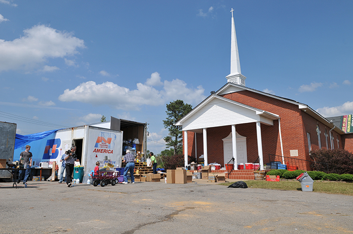 The Hackleburg Methodist Church (Alabama) serves as a disaster relief center for tornado survivors. Volunteers from Kansas and Wisconsin have come to help run the center. According to the Federal Emergency Management Agency (FEMA) faith-based organizations and groups are an integral part of the recovery process after disasters. (Photo Credit: By Tim Burkitt, courtesy FEMA, May 11, 2011).