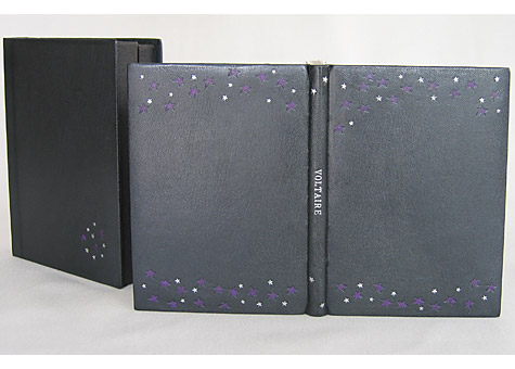 Cathy Adelman, Voltaire, Le Monde Comme Il Va Press Intermezzo, Austin, 2000; Full leather binding in the French style; leather doublures and fly leaf, graphite edge with silk endbands, paladium title and tooling, with leather onlays. 
