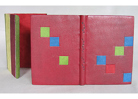   Binder: Coleen Curry, Enid Marx, Some Birds and Beasts and Their Feasts, Incline Press, Oldham, GB, 1997. Full leather goatskin binding in the French style; leather doublures and suede fly leaves, silk endbands, titled in soot.  