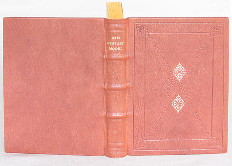  Binder: Heidi Ferrini, Model of 18th Century Full Leather Trade Binding. Full leather binding with gold and blind tooled decoration on front cover. Single flexible sewing around six- ply hemp cords is splayed out on laminated boards, with plain-leav