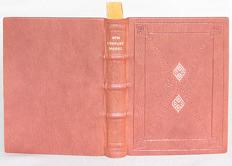 Binder: Heidi Ferrini, Model of 18th Century Full Leather Trade Binding. Full leather binding with gold and blind tooled decoration on front cover. Single flexible sewing around six- ply hemp cords is splayed out on laminated boards, with plain-leaved end papers, and double-core silk endbands.