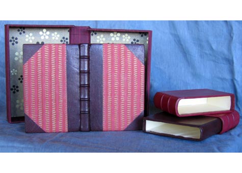  Coleen Curry, "Erasmus Collected Proverbs" Half goat skin leather binding with decorated Japanese paper. French binding with false raised bandes.on spine. Endpapers are the same Japanese paper as cover.. Inner special fireproof luxury box in same go