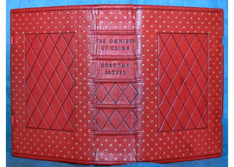  Tom Conroy, "The Omnibus of Crime" by Dorothy Sayers. Full scarlet Oasis leather binding with blind and gold tooling. Washed and gelatine sized; Herringbone sewing, laced in vellum spine linen over joins, back bead linen headbands over embroidered w