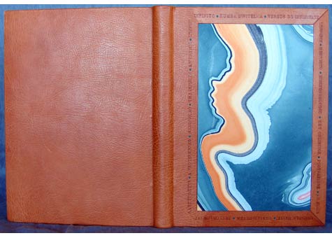 Nysa Wong Kline, "L'Infinito" A selection of translations of Leopardi's poem. Three-quarter binding in orange oasis. Onlays of turquoise calf. Blind-tooled titles in multiple languages frame the vibrant marbled paper to convey the essence of the poem. Sewn on cords with embroidered silk headbands in four colors. 9 1/2 x 13