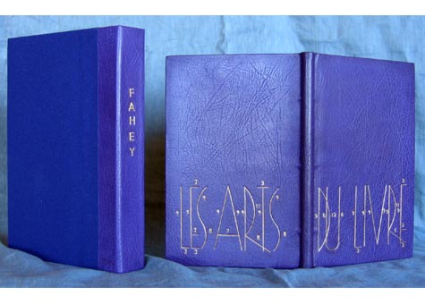 Gail Sulmeyer, "Finishing in Hand bookbinding" by Herbert and Peter Fahey. Full purple Harmatan goat leather binding and head is purple with gold. Ultrasuede endpapers and flyleaves. Purple leather spine box with purple book cloth lined in ultrasuede. 9 1/2 x 6 3/8 