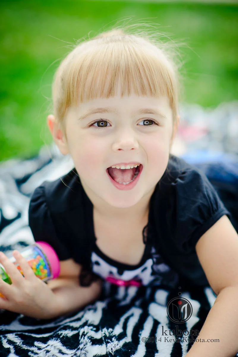 The Omega Reflector works great for close-up images of children. Notice the signature catchlights in the eyes. I used a Nikon D800 with 85mm f1.4 lens at f1.4 and aperture priority. Natural light only. Final image was enhanced with my Lightroom Presets package.