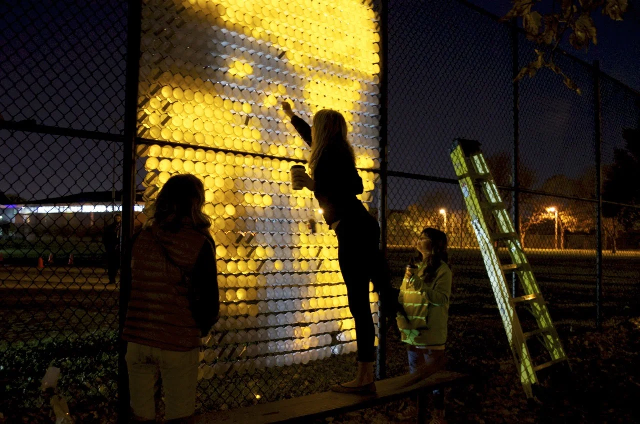 Artists and community members created a light up mosaic of Eva Calderon, November 2016
