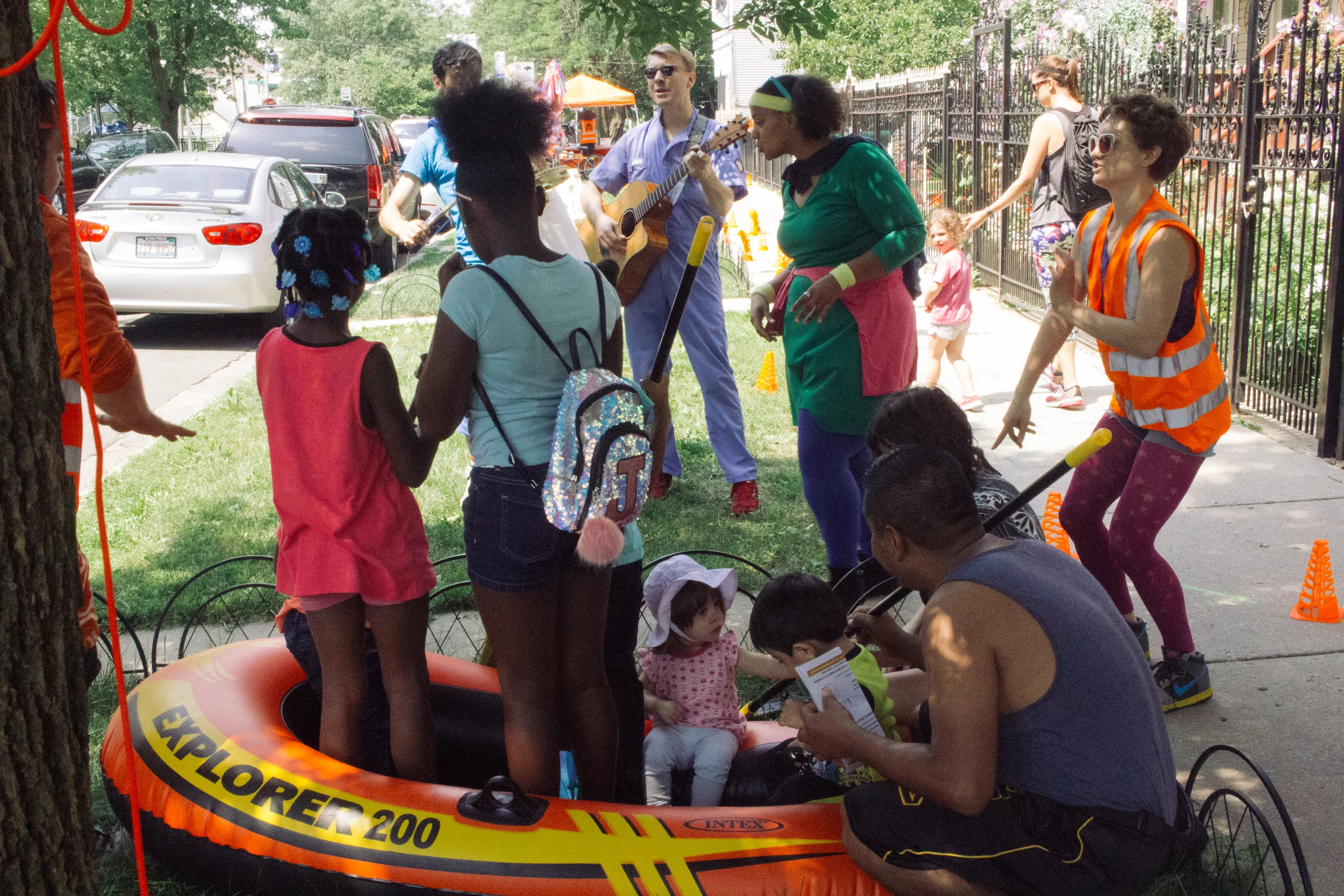 Opera-Matic artists, LUCHA residents, & neighbors participate in a Sidewalk Celebration, summer 2017