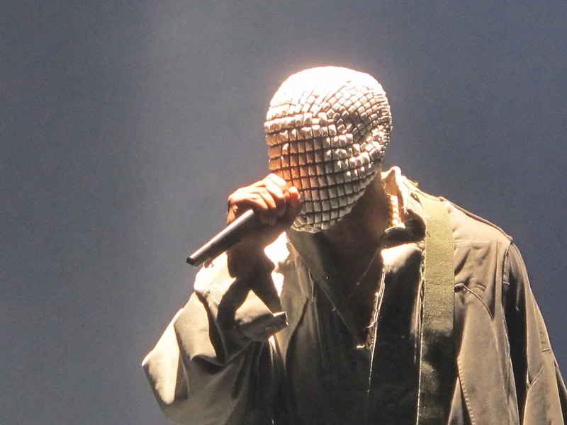 "Kanye West - Kanye Omari West" by Peter Hutchins is licensed under CC BY 2.0. To view a copy of this license, visit https://creativecommons.org/licenses/by/2.0/?ref=openverse