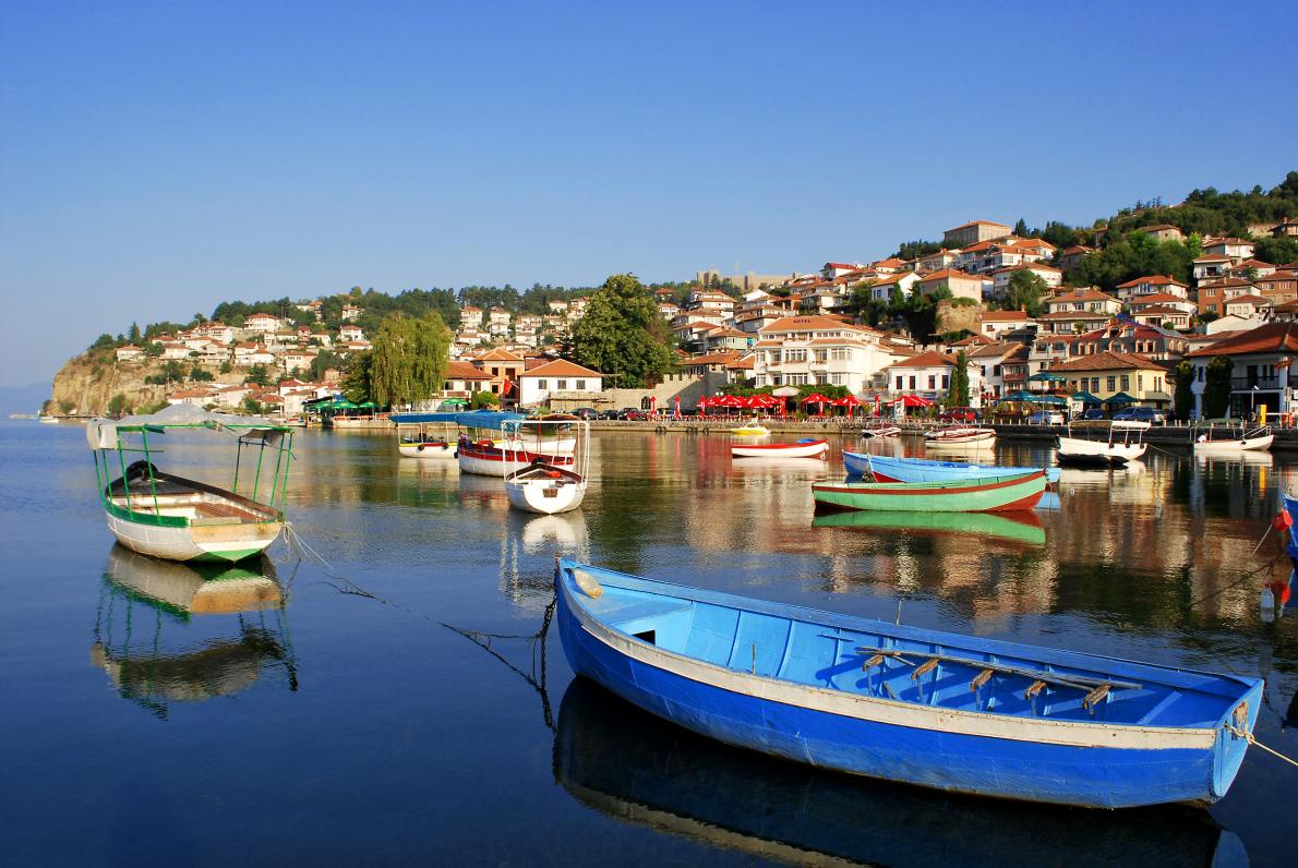 Fishing boats sway in the waters of Lake Ohrid, a World Heritage property. PHOTOGRAPH BY MALIJA, GETTY IMAGE