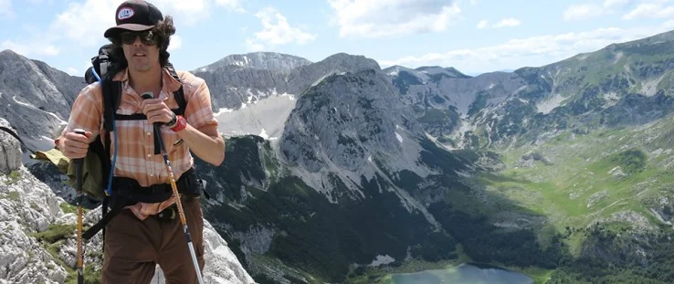 Alex Crevar stands in front of Trnovačko Lake in Montenegro near the Bosnia and Herzegovina border. - Thierry Joubert