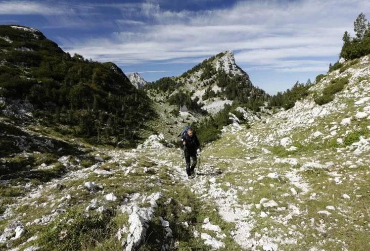 Kenan Muftic walks along the Via Dinarica on Prenj Mountain, Bosnia and Herzegovina - Elma Okic