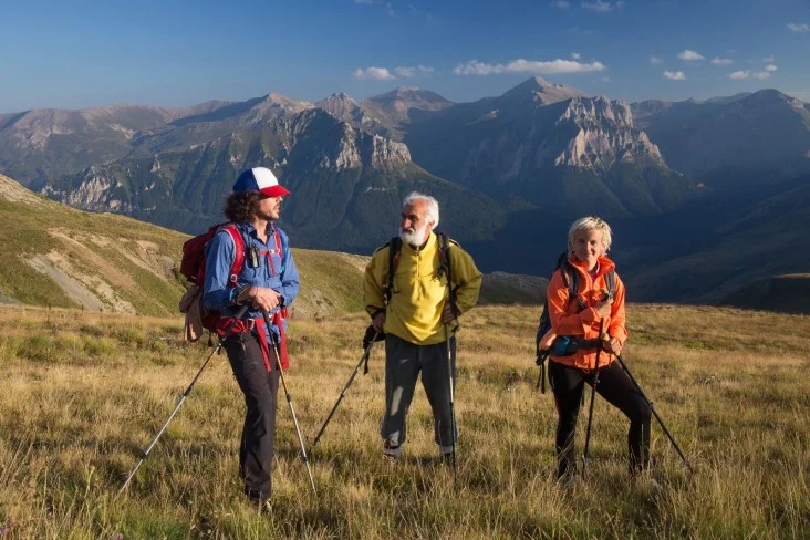 Via Dinarica hikers trek in Macedonia along the Šar Mountains. The range forms the border between Macedonia and Kosovo. Left to right, Alex Crevar, Miroslav Donev (Aleksandar's father) and Uta Ibrahimi - Aleksandar Donev