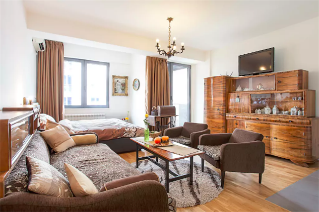 Suzana’s studio apartment is conveniently located just 10 minutes from the train station and right next door to the Church of St. Clement of Ohrid, the largest cathedral of the Macedonian Orthodox Church. It’s in Debar Maalo, known as the bohemian part of town, where you can easily walk to Skopje’s main square, parks, and the Turkish bazaar. The apartment is decorated with 19th century antiques including a sewing machine and tea service, but it also has modern amenities like Wi-Fi and air conditioning. Those who stay 10 days or longer get free laundry service.