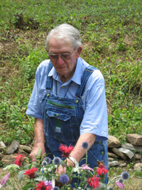 Lisle V. Roberts with flower arrangement