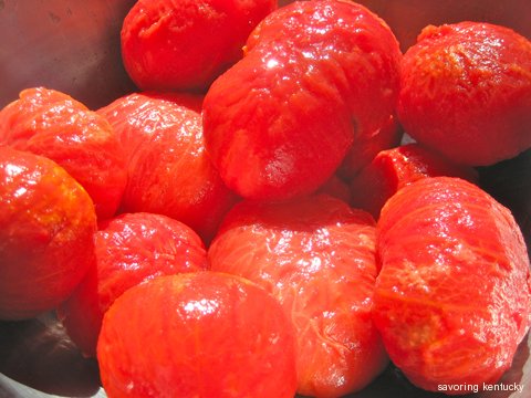 Peeled late summer tomatoes, ready for saucing