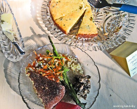 A potluck dinner table and plate