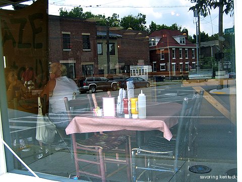 Neighborhood reflected in Ramsey's Diner window, Woodland area, Lexington, Kentucky